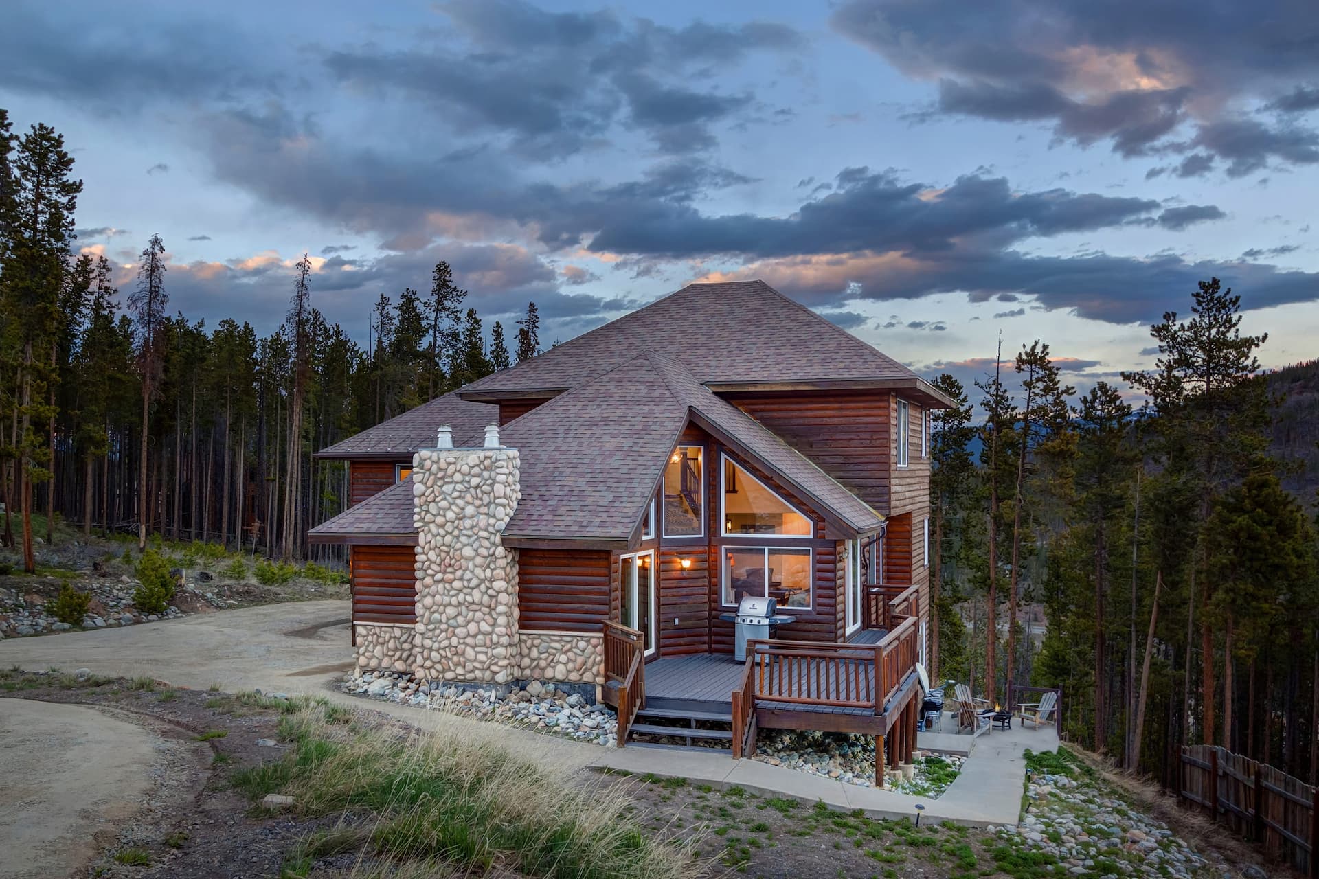 sunset along the beach with drift wood, high res